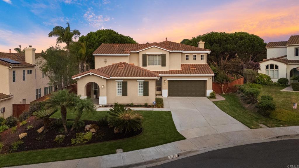 The perfect family home in Carlsbad’s desirable Evans Point neighborhood offers a flexible floor plan designed to meet today’s needs. This home features an oversized downstairs bedroom with a full bath — offering the ideal setup for creating a granny flat or private office space. Set on a spacious .26-acre lot in one of Carlsbad’s most desirable neighborhoods and school districts, this refreshed 4-bedroom, 3-full bath residence balances comfort and flexibility with timeless appeal. The primary suite upstairs is a true retreat, boasting dual walk-in closets and a spa-like ensuite with dual vanities, soaking tub, and separate shower. Fresh new carpet and interior paint and other updates make this home move-in ready, while the expansive, beautifully landscaped front and back yards and large backyard patio create the perfect space for entertaining or relaxing outdoors. With easy access to Carlsbad’s beautiful beaches, local parks, and trails, plus ultra-convenient I-5 access for commuting to San Diego or Orange County, this home offers both lifestyle and location. Don’t miss this rare opportunity in Evans Point.