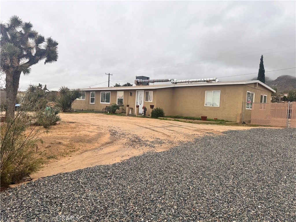 Photo of 60325 Natoma Trl, Joshua Tree, CA 92252 (MLS # SW25263945)