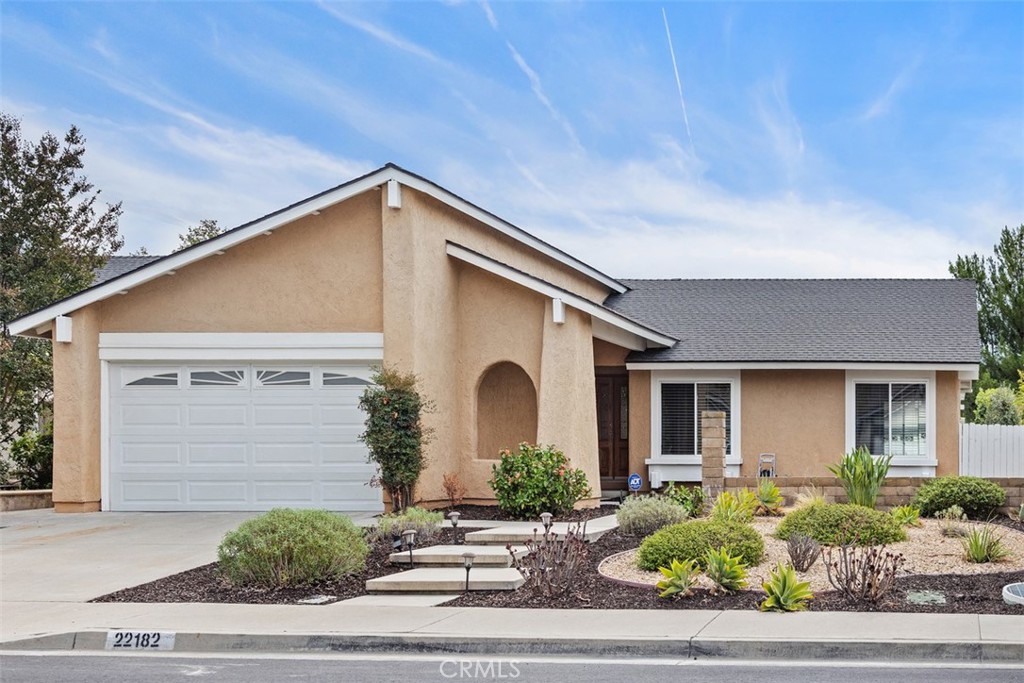 Immaculate SINGLE LEVEL home designed for easy living inside and out! Perched on a hilltop in the scenic Castille community, this home offers a perfect blend of comfort, style, and functionality—all set against a serene backdrop of mature trees, open skies, and distant mountains that glow with the sunrise! Step inside to an open and inviting floor plan, where the spacious kitchen, dining, and living rooms flow seamlessly together to create one expansive great room. The upgraded kitchen shines with new cabinetry, granite countertops, and a breakfast bar. Just off the great room, a versatile third bedroom with French doors offers the perfect space for a home office, media room, or quiet retreat with another secondary bedroom and guest bath just down the hall. Awaken to soft morning light in the generously sized primary suite with walk-in closet and ensuite bath with walk-in shower. Step outside to your private backyard oasis, where a large patio, sun deck, and even a putting green draws you outdoors to relax in a stunning natural setting. You’ll find even the garage impresses, with an epoxy floor, overhead storage with built-in ladder – plus the peace of mind of a NEW WASHER, DRYER, and WATER HEATER. When the day winds down, enjoy dinner by the water at one of the nearby restaurants with beautiful views of Lake Mission Viejo. Life here is more than just a home – it’s a lifestyle to enjoy every day!