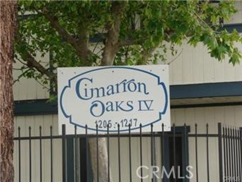 Photo of 1209 S Palmetto Avenue #C, Ontario, CA 91762 (MLS # CV26000732)