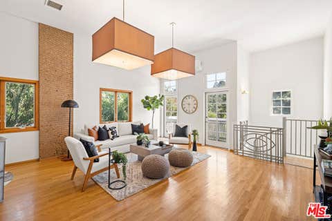 Photo of 8781 Lookout Mountain Avenue, Los Angeles, CA 90046 (MLS # 26870127)