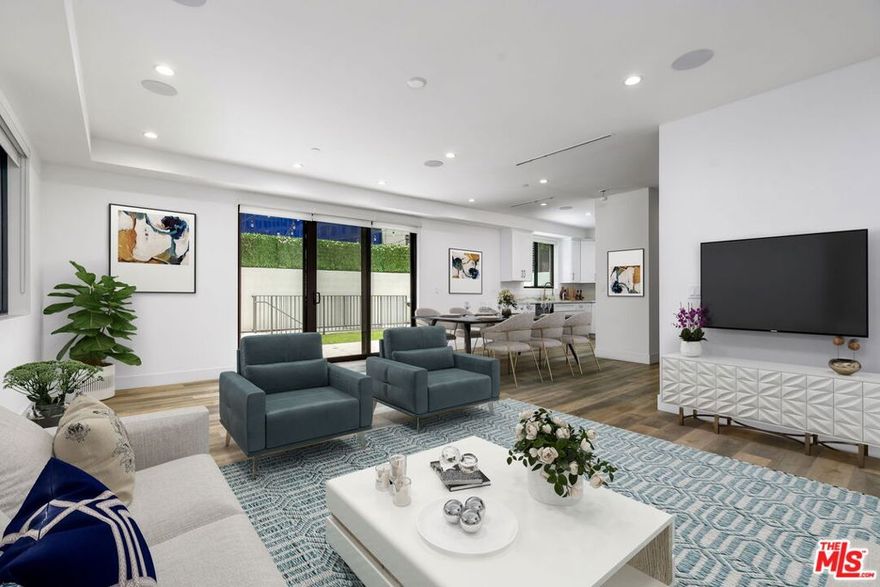Beautiful 3-story apartment unit in prime West Hollywood Location. The unit comes with a private rooftop, private patio and backyard, wide open living room, new modern look, with an elevator served underground parking. Spacious bedrooms with excellent exterior lighting.