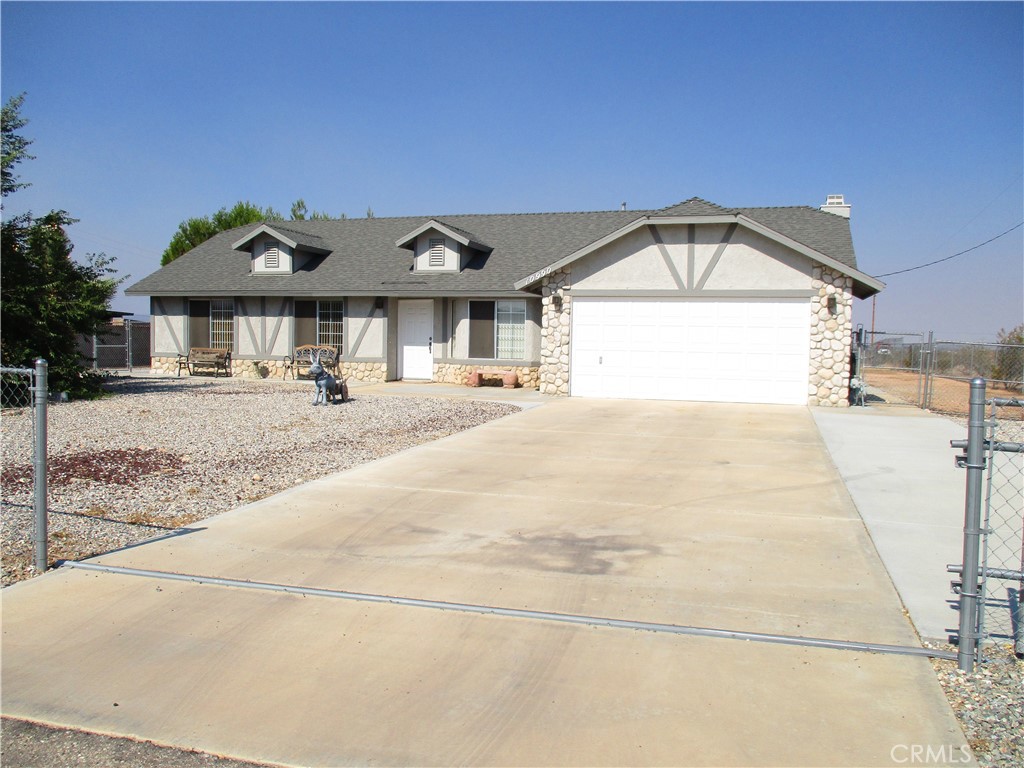 CHARMING APPLE VALLEY HOME! BEAUTIFUL VIEWS! ALMOST 1 ACRE! QUIET AREA! Take a look at this very well kept property in southwest Apple Valley, built in 1987, complete with 1500 sq. ft. of living space, nearly 1 acre lot, 3 spacious bedrooms, 2 very clean bathrooms, open formal living room, large formal dining room, super clean kitchen with granite counter tops, stainless steel appliances, oak cabinetry, breakfast bar, beautiful family room with river rock fireplace, covered back patio, a huge 24' x 12' storage shed in backyard with concrete walkway, several fruit trees, (plum, apricot, Japanese plum, juju bee, pomegranate & lemon) nice garden area, full chain link fencing around entire property, cross fenced as well, 2 car garage with automatic opener, close to schools, shopping, restaurants & entertainment! Come check it out!