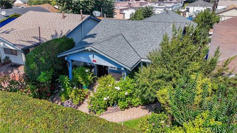 Photo of 1711 W 59th Place, Los Angeles, CA 90047 (MLS # SB25236566)