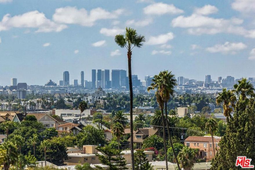 Stunning 2-Story Townhouse with Panoramic City Views in Silverlake. Experience modern living in this bright and spacious 2-story townhouse, perfectly positioned in a newly updated 6-unit building. Revel in breathtaking panoramic views that stretch from downtown Los Angeles to Century City, with spectacular sunsets that light up the skyline. Features include: Outdoor Spaces: Two sunny balconies with stunning views and a large private patio with a separate entrance. Interior Design: Rich, dark hardwood floors, soaring high ceilings, and abundant natural light. Modern Amenities: Stainless steel kitchen with a brand-new fridge, oven, and stove; in-unit washer/dryer; A/C; and a Nest thermostat for comfort and convenience. Parking & Security: Gated entry with intercom system and secure parking featuring two side-by-side spaces. Located in a peaceful, hilly neighborhood, this home offers a serene retreat while being a short distance to Silverlake's best bars, cafes, shops, and restaurants. Enjoy the nearby Silverlake Reservoir and park for outdoor activities. With quick access to the I-5, 101, and 2 freeways, this central yet quiet location is ideal for urban convenience and tranquil living. Small, Friendly Community: The complex is intimate, quiet, and neighborly, making it a welcoming place to call home. Don't miss this rare opportunity to enjoy the best of Silverlake living!