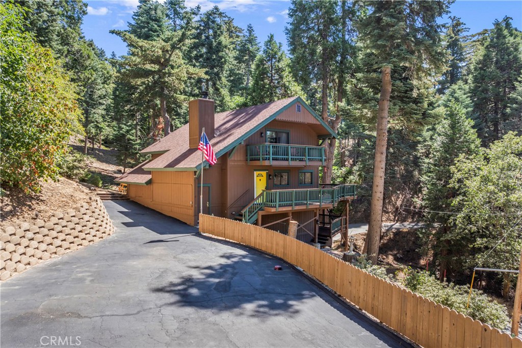 Correction: Zillow displaying wrong address. Property is located in Skyforest, Lake Arrowhead, 92385.
Welcome to one of the most coveted locations in Skyforest - "The Loop." This Fully remodeled 3-bed, 2-bath home offers 1,524 sq. ft. of modern living space across two levels, plus a 600 sq. ft. finished build-up on lower level. Situated on an expansive 1.19 -acre, street-to-street lot- this property gives you the feeling of owning your own private forest. Every window frames a beautiful view of towering trees, with brilliant seasonal color changes and California Mountain dogwood trees scattered throughout the property. Imagine sitting at your deck with the canopy overhead while enjoying the privacy barbequing your hamburgers looking out at the beautiful Forest views.
FEATURES & UPGRADES
Newly remodeled – inside and out
Three oversized bedrooms | 2 bathrooms | 1,524 sq. ft. + 600 sq. ft. finished build-up
Two-story floor plan with spacious, open-concept living
Wrap-around main deck plus two additional decks – perfect for entertaining or enjoying tree-top views
Massive walk-in closets in upstairs bedrooms with brand-new cabinetry and custom clothing storage systems
Extremely rare 3-step entry – easy, convenient access that few mountain homes can match
Expansive paved private parking with space for 10+ vehicles — ideal for boats, smaller RVs, and hosting many guests with ease
Only 2 minutes from Highway 18 for quick, convenient access on or off the mountain via Hwy 18 or 330
Street-to-street lot offering privacy and unique property layout
All major appliances new within the last 3-4 years — refrigerator, chest freezers, water heater, central heater, oven, and microwave
County-maintained and plowed roads – year-round access and peace of mind during winter months
Located in the exclusive Skyforest Loop neighborhood
LOCATION & LIFESTYLE
Just 10 minutes from Lake Arrowhead Village for dining, shopping, and entertainment, and a short 5 minute drive to Heaps Peak Arboretum for beautiful forest trails and outdoor adventures. This home offers the perfect blend of privacy and accessibility — ideal for full-time living, a weekend retreat, or a lucrative vacation rental.
WHY YOU'LL LOVE THIS HOME
With over an acre of land, you’re not just buying a home — you’re claiming a private mountain sanctuary. Enjoy forest views from every room, brilliant fall foliage, and blooming mountain dogwoods in the spring.