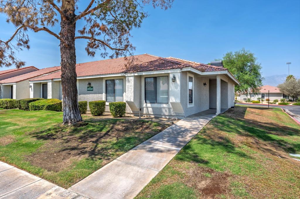 Escape to the tranquil oasis of Palm Lake, a guard-gated community boasting a resort-style lifestyle. This well maintained, ground-floor condo offers a rare combination of privacy and convenience. Imagine waking up each morning in your beautifully renovated 2-bedroom, 2-bathroom home, complete with a private enclosed patio. Step inside and discover an open, sun-drenched living space. The recently remodeled kitchen is a chef's delight, featuring sleek quartz countertops, updated cabinetry, and ample workspace. The main bathroom has been tastefully updated, and the spacious primary suite includes a generously sized walk-in closet, providing plentiful storage. New carpeting in both bedrooms ensures luxurious comfort underfoot. The in-unit washer and dryer hookups add to the home's practicality. Beyond the comfortable interior that has been recently re painted, Palm Lake offers an exceptional array of amenities designed to enhance your daily life. Enjoy leisurely swims in one of two sparkling pools, relax in the rejuvenating spa, or challenge friends to a game on the tennis courts. Maintain your fitness regime in the well-equipped fitness center. The exceptionally low HOA fee of $400 covers all exterior maintenance, including landscaping, roof repairs, pool and spa upkeep, as well as access to the clubhouse, fitness center, and volleyball courts. This exceptional property is ideally suited for full-time residents, seasonal escapes, or savvy investors. Its prime location provides easy access to El Paseo's upscale shopping and dining, and major shopping centers are just a short drive away. Don't miss this opportunity to own a piece of paradise. Give me a call to schedule an appointment.