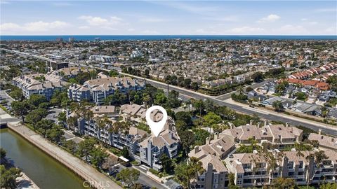 Photo of 20251 Cape Coral Lane #101, Huntington Beach, CA 92646 (MLS # OC26084661)