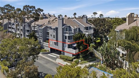 Photo of 20251 Cape Coral Lane #101, Huntington Beach, CA 92646 (MLS # OC26084661)