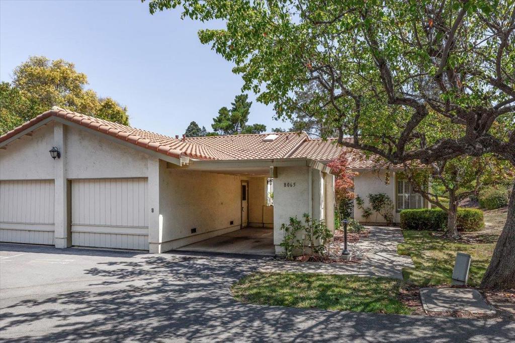 Welcome to your next chapter at The Villages Golf & Country Club! An active senior community, one person must be 55+. This wonderful single level end-unit offers 2 bedrooms and 2 bathrooms in 1496+/- of living space. Bring your creativity and make this wonderful unit your private oasis, enjoying all that The Villages has to offer! Vaulted ceilings, skylights, slider doors to rear patio, fresh interior paint, newer carpet, newer HVAC. Single garage and single carport with nearby guest parking available. HOA fee includes Golf Membership, gated, security guard access, Water/Sewer/Cable TV/Garbage, Community newspaper,18 hole golf course, 4 Swimming Pools, 6 Tennis Courts, 3 Bocce Ball courts, 4 Pickleball Courts, Exercise Facility, two restaurants, Library and a US Post office, and more!