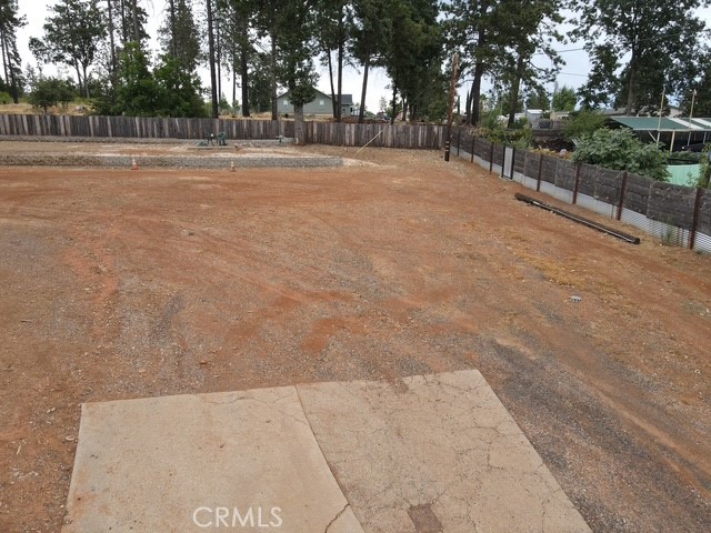 Great lot that is over half an acre situated in a private in-town location at the end of the street. Lot is very clean and level. Previous home was a four bedroom of nearly 1800 feet. Septic was inspected 05-20 and is good. Report is in supplements. PID water is current. This is a super lot for someone looking for an in close but private setting. Go take a look.