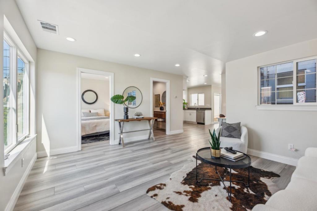 Dreaming of your own slice of San Francisco charm? Welcome to this beautifully updated single-story home in the heart of the Excelsior, where city living meets comfort and convenience. Just steps from the rolling trails and open space of John McLaren Park, this home invites you in with warmth and ease. Inside, natural light fills every corner. The living, dining, and kitchen areas flow together effortlessly creating a space that feels cozy and connected, perfect for unwinding or gathering with loved ones. Extensively remodeled in 2023, this home blends modern finishes with timeless character. But the true magic happens at the back. Two expansive sliding glass doors wrap the rear corner, opening wide to reveal a rare San Francisco treasure: a spacious backyard retreat. Whether you're enjoying a quiet morning or relaxing in the sun, this outdoor space offers a level of freedom and privacy thats hard to come by in the city. With two comfortable bedrooms, two updated baths, in-home laundry, and a generous 2,596 sq ft lot, this home balances ease and city living. The backyard offers potential for an ADU ideal for extended family, a private guest suite, or added rental income. Dont miss your chance to make this charming San Francisco home yours