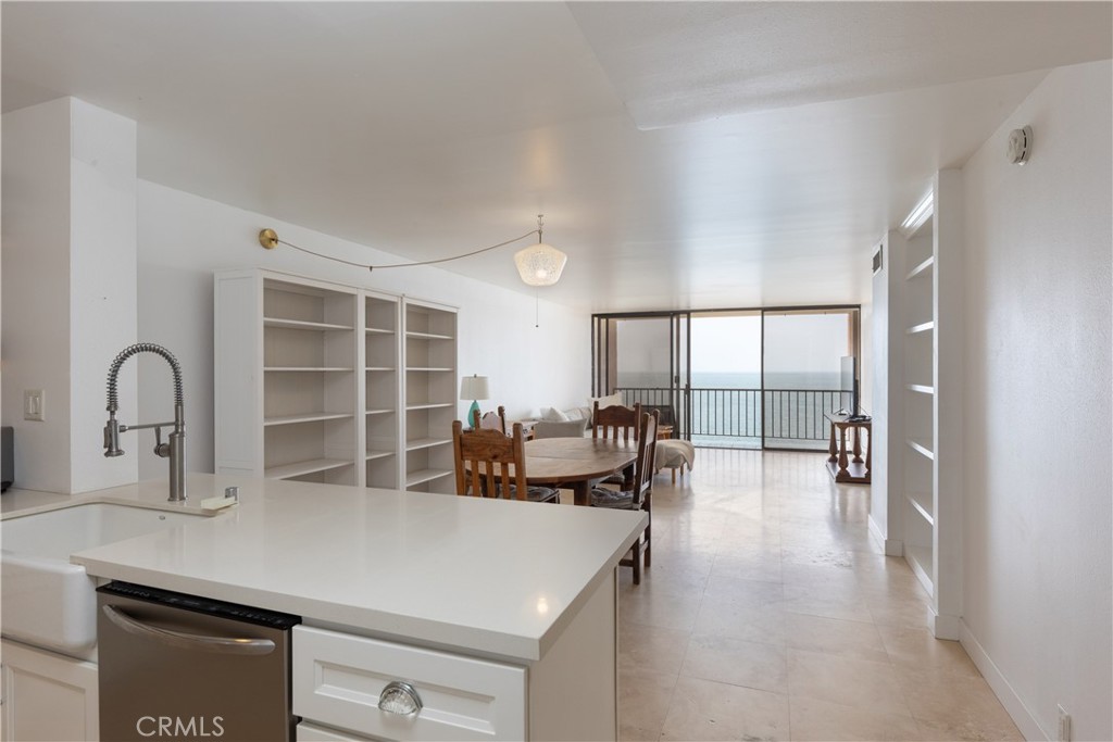 Don’t miss this incredible opportunity to own one of the largest two-bedroom condos in the highly coveted Queens Surf—an oceanfront gem offering unbeatable value and breathtaking panoramic views of the Pacific Ocean, Catalina Island, the Marina, and beyond. From golden sunsets to the sound of waves just outside your window, this home delivers the ultimate Southern California beach lifestyle. Perfectly positioned between vibrant Belmont Shore and downtown Long Beach, you’re steps from the beach, the scenic bike path, and the sand itself. This spacious 2-bedroom, 2-bath unit was recently completely renovated. The layout is generous, with some of the best views in the building, making every day feel like a vacation. Enjoy resort-style amenities including a beachfront pool and spa, a community lounge with full kitchen, fitness center, sauna, showers, and direct beach access. Two secure parking spaces are conveniently located. On-site management is available to receive packages and ensure a smooth living experience. Explore everything Long Beach has, from the Long Beach Museum of Art and Aquarium of the Pacific to the Queen Mary, Grand Prix, Rainbow Harbor, and dozens of restaurants, shops, and markets. Ocean Boulevard doesn’t get better than this—rarely does a unit with these views and size come to market.