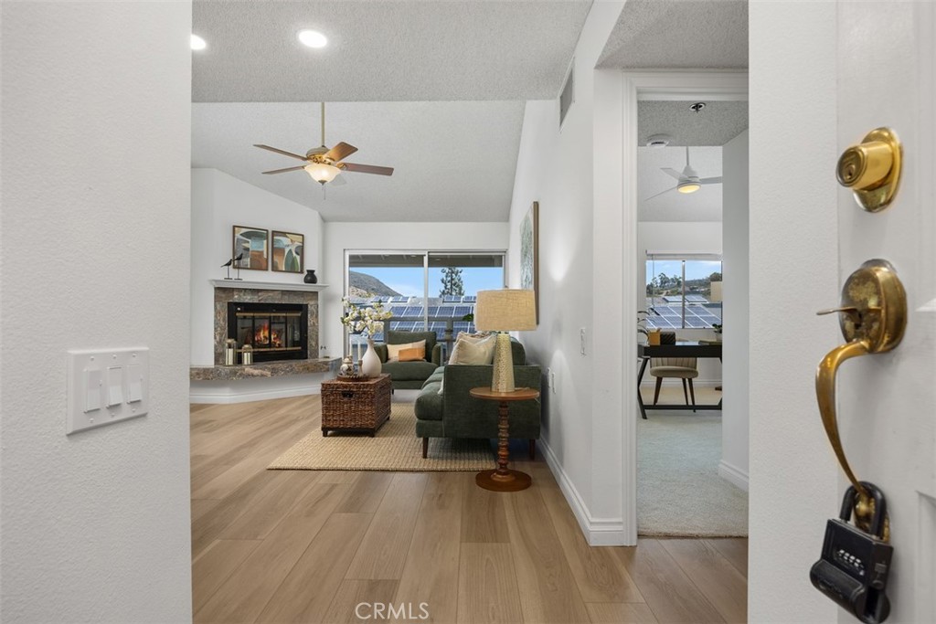 Welcome to The Chateau at Lake San Marcos, a premier 55+ independent living community in the heart of North County! This rarely available top-floor home offers two bedrooms, two full bathrooms, and a private balcony with tranquil views - perfect for enjoying peaceful mornings and colorful evening skies. With no neighbors above, this is one of the most desirable units available for sale at this time. Vaulted ceilings, ceiling fans, fresh paint, and brand new - permitted - hard surface flooring are only few of the highlights. The primary suite includes a spacious walk-in closet and the second bedroom is ideal for guests or a home office.
The HOA provides one gourmet meal credit per day, bi-weekly housekeeping with linen service, transportation for shopping, medical appointments, and outings, as well as concierge services, fitness classes, and a wellness program. Additional amenities include a heated pool and spa, fitness center, putting green, library, computer stations, dog park, and a fireside lounge, all within a gated community with nighttime security. Residents also enjoy full access to the Lake San Marcos Community Association with walking paths, golf courses, pickleball, tennis, events, and waterfront dining.