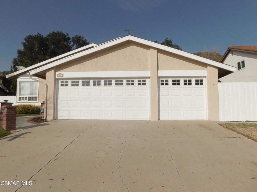 WELCOME to the highly coveted Wildwood neighborhood! Step inside this spacious remodeled 4 bedroom 3 full bath home with large double pane windows and vaulted ceilings which allows an abundant amount of light coming through the Living and Dining Rooms! The step-down Den includes a gorgeous travertine fireplace! To your right, you'll find a bar with built-in shelving to store your favorite wines, glasses and more! Enjoy cooking in the light and bright, updated Granite Kitchen with lots of cabinets, a lazy-susan, stainless steel appliances, including the Refrigerator! You have a choice of dining at the kitchen island with bar stool seating, the Breakfast Nook or in the formal Dining Room! Over the kitchen sink is a large Bay Window, that overlooks the peaceful, spacious backyard with views. There are also views from the upstairs windows in PRIMARY BEDROOM! The large Primary Bathroom Suite offers double sinks, a step-in shower, plus a large, deep clothes closet. Two other Bedrooms upstairs have use of the FULL Bathroom in the hall and the linen closet. MUST HAVE A DOWNSTAIRS BEDROOM and FULL Bath! Washer and Dryer in the convenient INDOOR utility room has lots of cabinet storage! French double doors in the Den opens up to the large backyard that has 2 gated side yards (great for a dog run), one side even has a storage shed. 3 CAR GARAGE has easy to clean epoxy floors, direct hookup for TV and lots of storage! Save energy with ALL Double Pane windows, energy efficient & quiet whole house fan, multiple ceiling fans and a newer energy efficient HVAC system! The entire home has recessed LED lighting! Best of all, Wildwood has amazing hiking trails, water falls, a huge park which offers baseball & hockey fields, tennis & basket ball courts and a fun playground for the kids! Award winning Wildwood Elementary School is nearby. Shop at your favorite Trader Joe's, Vons, Ralphs, Sprouts, Starbucks, the Oaks Mall, fine restaurants and more! You deserve this home so hurry before it's gone!