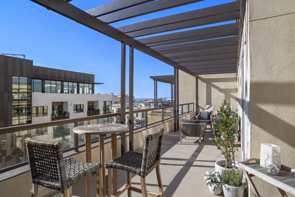 Location and views in downtown Oceanside! Prestigious top floor Penthouse in one of the most desirable buildings in all downtown Oceanside - Oceanside Terraces. Located in the heart of downtown Oceanside, only 2 blocks to the Pier and miles of golden beach, this luxurious residence is offered fully furnished and turnkey. This single level, 3 bedroom, 2 1/2 bath offers expansive views from the living area, both bedrooms, and from the oversized. (323 sq. ft.) huge lanai with firepit and BBQ that creates a perfect setting for indoor/outdoor living So Cal style! This pristine penthouse is adorned with hardwood floors, granite counters, stainless appliances, 2 fireplaces, laundry room, and dining area. The primary bedroom's ensuite bath offers a huge soaking tub, and large walk-in shower, along with an expansive walk-in closet. The bonus room with Murphy bed offers flexibility to be used as an office, den, or guest bedroom. The open and well thought out floor plan offers the residence and guests a perfect setting to relax and entertain. The entire living area is open to the Lanai via large sliders, as are both bedrooms. Breathe in the cool ocean breezes and relax in your private penthouse sanctuary with expansive views to the north and south. Amenities of the building include a jacuzzi, exercise room/gym, BBQ area, lounge area with large outdoor fireplace with a tropical/tranquil setting, and underground side by side parking for 2 cars. All of this in a secured private access building with 24-hour security. Everything is elevator accessible so no need to ever climb stairs, and all of this is within walking or biking distance to everything Oceanside offers, including the transit center only a block away with trains to LA and SD. Included with rent are all utilities, and once a month cleaning service. 4-9 month lease preferred, shorter leases negotiable at higher rates.