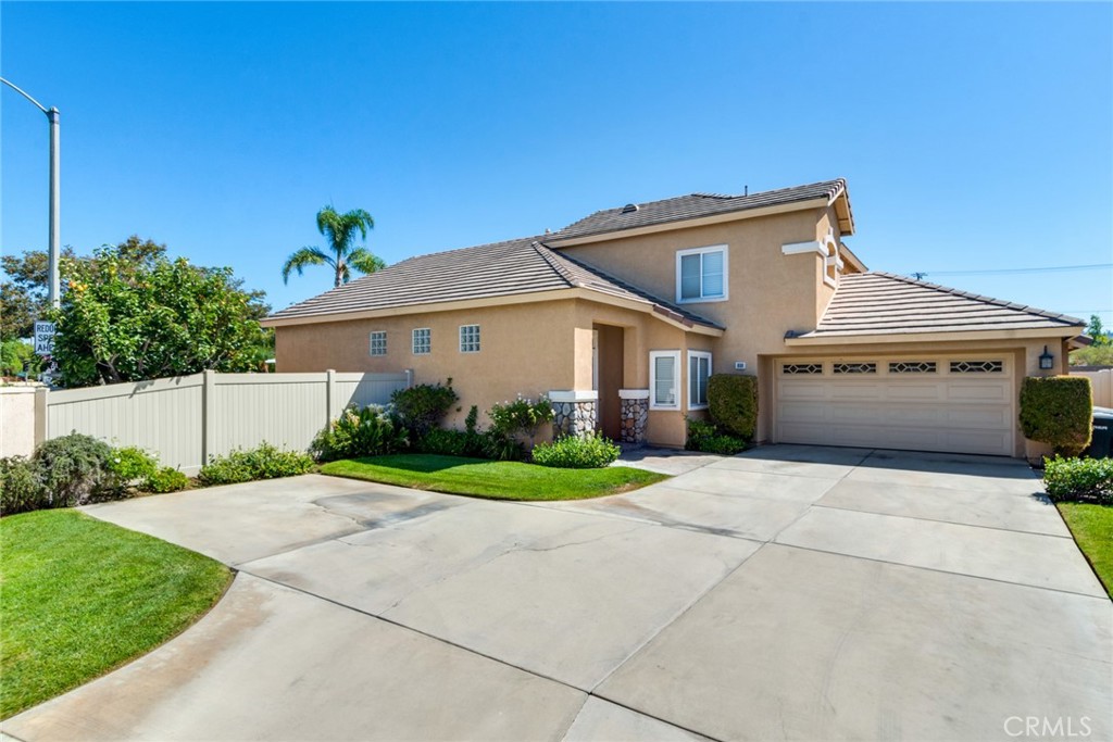 Welcome home! Fabulous home in the gated community of Kensington!
This home offers formal living space with a high, vaulted ceiling, abundant windows and pony wall to the formal dining room, featuring a sliding glass door to a backyard patio. The family room is cozy with a gas fireplace, media niche, and windows with plantation shutters. Open to the kitchen with breakfast bar/island, lovely eating area, pantry, stainless steel appliances, including gas cooktop, built-in oven, vent hood, microwave and dishwasher. Amazing floor plan with primary bedroom located on main level of the home, this bedroom features a cathedral ceiling, slider to the backyard, and walk-in closet. The primary bathroom offers dual sinks, with built-in vanity, remodeled soaking tub and shower. Convenient downstairs secondary bedroom and full bathroom. Laundry room with storage/linen cabinets. Upstairs offers two additional bedrooms- Hollywood bathroom with dual sinks and tub/shower combo. Backyard with lattice covered patio, cool grassy area and stylish palms. This community offers a pool and spa with large deck and patio tables. Don’t miss out on this home!