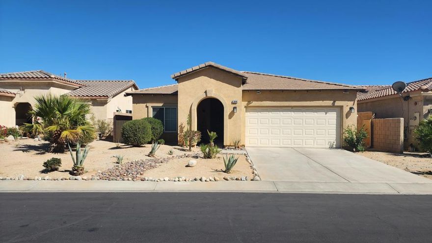 Currently lowest price home in community.  3 BD,   Move in ready.  Nice open great room floorplan, gas fireplace with modern glass pebbles, large island  with bar seating.  Kitchen has Stainless steel appliances and large pantry.  Backyard has just been reseeded and patio cover restored and painted.  Family Community has super low HOA dues with amenities that include 3 pools and spas, tennis courts, basketball court, BBQ area, picnic area, playground, roving security.  Located just off Palm Canyon, a short drive to shopping, dining, entertainment, and the PS Tram.