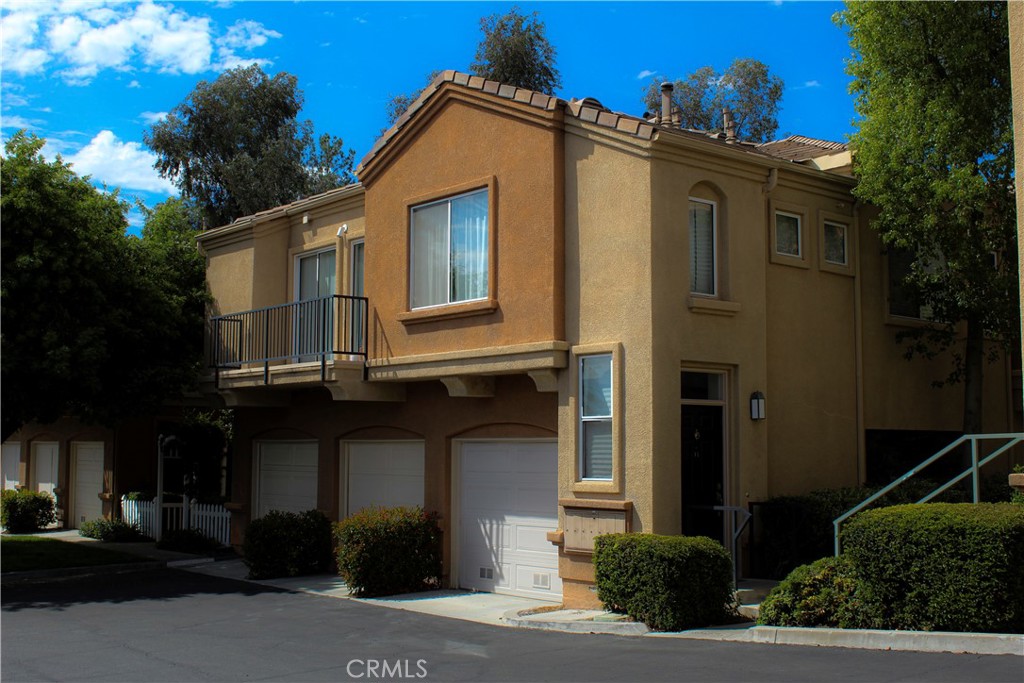 This two story condominium is located in the well sought after Rose Arbor Community. It’s a very well taken care of two story unit in turn key condition. It’s features include immaculate grey wood effect tile, recessed lighting throughout, stainless steel kitchen appliances, a large patio with plenty of room for personal touch landscaping, an ample dining area, two garages (one attached and the other detached), washer/dryer hookups in the attached garage. Once upstairs, you are met with two bedrooms (they have more than equate closet space), two full baths with the en-suite bathroom having dual sinks. The unit also comes with forced air heating and cooling (the A/C unit has been replaced recently). There is also a beautiful well maintained community pool for you and your guests to enjoy. Schedule a showing to come and see this nicely maintained beauty.