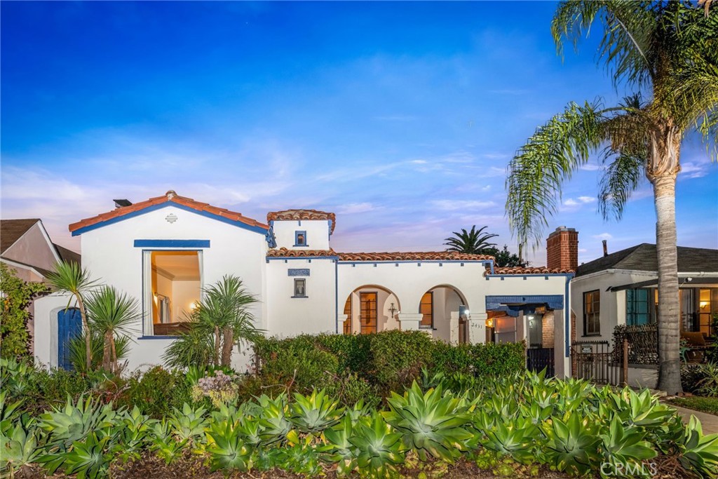 Discover the charm of this Spanish-style home in the highly sought-after Reynier Village/Beverlywood adjacent neighborhood. The inviting front yard, adorned with desert plants, perfectly complements Los Angeles' warm climate. Inside, the spacious living room boasts soaring 10-foot ceilings, abundant natural light, and a beautiful gas and wood-operated fireplace. Curved archways throughout add architectural elegance, while the open floor plan seamlessly connects the living area to the formal dining space—ideal for entertaining.
The thoughtfully remodeled kitchen features custom cabinetry while preserving the original Spanish tile wall. A bright breakfast nook, surrounded by windows, provides the perfect spot for morning coffee. Refinished hardwood floors extend throughout the home, with crown molding enhancing the living room, dining room, and kitchen nook. A spacious laundry area offers extra counter space and storage.
Both bathrooms have been lovingly restored with vibrant, era-specific tiles. The second bathroom includes a steam shower and a unique skylight that channels natural light from the atrium—also featured in the hallway. Most windows are adorned with Spanish-style exterior blinds, offering both security and blackout functionality.
The home also boasts copper plumbing, an updated electrical panel, and a charming backyard with twinkling lights and avocado and persimmon trees, creating a serene setting for relaxation or entertaining. A detached two-car garage provides ample storage or ADU potential, plus a carport for additional parking.
This home will be delivered PARTIALLY furnished, offering a seamless move-in experience. Conveniently located near Beverly Hills, Downtown Culver City, The Art District, Ivy Station, and major studios like Sony, Amazon, Apple, and HBO. Don’t miss this captivating gem!