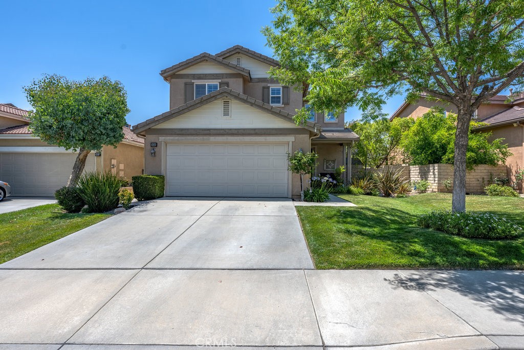 Welcome to this beautifully updated 3-bedroom home with a versatile office space, located in the heart of Saugus. Step inside to find stylish laminate flooring throughout the main level and a dedicated downstairs office—perfect for remote work or quiet study.
The recently remodeled kitchen features sleek stainless steel appliances and a modern layout, ideal for both casual meals and entertaining. Upstairs, you'll find all bedrooms thoughtfully equipped with ceiling fans, alongside a convenient laundry area. Elegant hardwood shutters add a sophisticated touch throughout the home.
Retreat to the luxurious primary bathroom, showcasing honeycomb tile flooring, a standalone soaking tub, and refined mirrors—your private spa oasis.
Outside, enjoy a beautifully landscaped backyard perfect for relaxing or gathering with guests. The home is equipped with money-saving solar panels and is just minutes from one of Santa Clarita’s premier shopping centers. As part of a vibrant community, you'll have access to a sparkling pool, basketball courts, and proximity to award-winning schools.