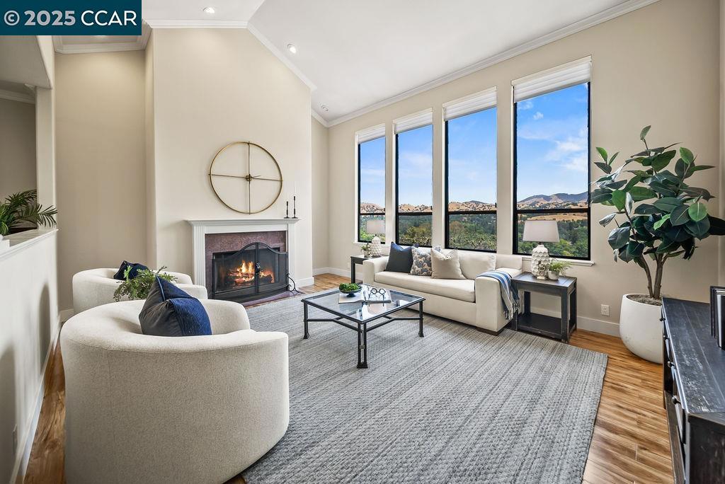 Welcome to 172 Rudgear Rd – where panoramic Mount Diablo views and refined living come together in perfect harmony. Perched on a prime Walnut Creek hillside, this beautifully appointed home offers breathtaking vistas from nearly every room. Inside, you'll find an excellent floor plan designed for comfort and versatility, featuring soaring ceilings, tasteful décor, and two spacious family rooms—ideal for relaxing or entertaining. The freshly updated kitchen shines with new quartz countertops, while the updated baths offer modern elegance throughout. The luxurious primary suite serves as a private retreat, complete with serene views and spa-like finishes. Multiple expansive decks provide the perfect setting for indoor-outdoor living, whether you're sipping coffee at sunrise or hosting gatherings under the stars. With a flat driveway, ample parking, and plenty of level outdoor space, there’s room to create the play yard, garden, or outdoor haven of your dreams. Stylish, spacious, and set against one of Walnut Creek’s most iconic backdrops—this is a home you won’t want to miss.