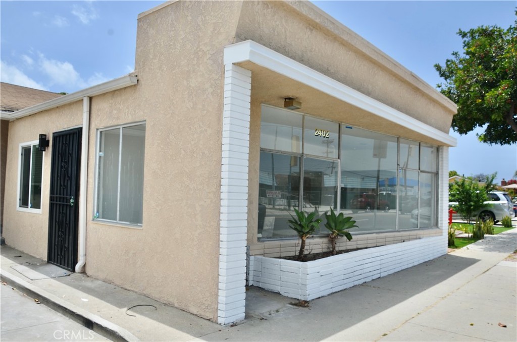 Welcome to 2402 Marine Avenue! This office/retail space has been fully renovated, with approximate 700SF of space (tenant to verify SF). New drywall, new paint, new tile flooring, updated bathroom, and new paint outside! The space has an all-window frontage facing one of Gardena's best commercial corridors on Marine Avenue, allowing so much exposure to potential clients walking and driving by. Due to the front wall of windows, the space also has an abundance of natural light perfect to showcase your business. In addition to the great room, you will have a 1/2 bath and a private office with a separate entrance. 1 parking space is assigned in driveway (driveway shared with other tenants). Water included in monthly lease. Call to view!