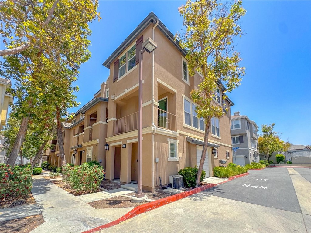 Welcome to this beautifully maintained tri-level corner unit condo offering 1,494 square feet of comfortable and functional living space. This home features 3 bedrooms and 2.5 bathrooms, along with an attached two-car garage located on the first level for easy access and added convenience.
On the second floor, you'll find an open-concept living area with an updated kitchen complete with brand-new countertops. The living room features a cozy fireplace and opens to a private balcony, perfect for relaxing or entertaining. A powder bathroom and a separate laundry room are also located on this level, offering both practicality and style. The top floor includes all three bedrooms, including a spacious primary suite with its own en-suite bathroom. The additional two bedrooms are well-sized and share a full bathroom, making this layout ideal for families or guests.
Located in a well-maintained community with low Mello-Roos and special assessments, this home also offers access to excellent amenities including a community pool and park. Conveniently situated near shopping centers and everyday essentials, this condo blends comfort, value, and lifestyle in one great package.