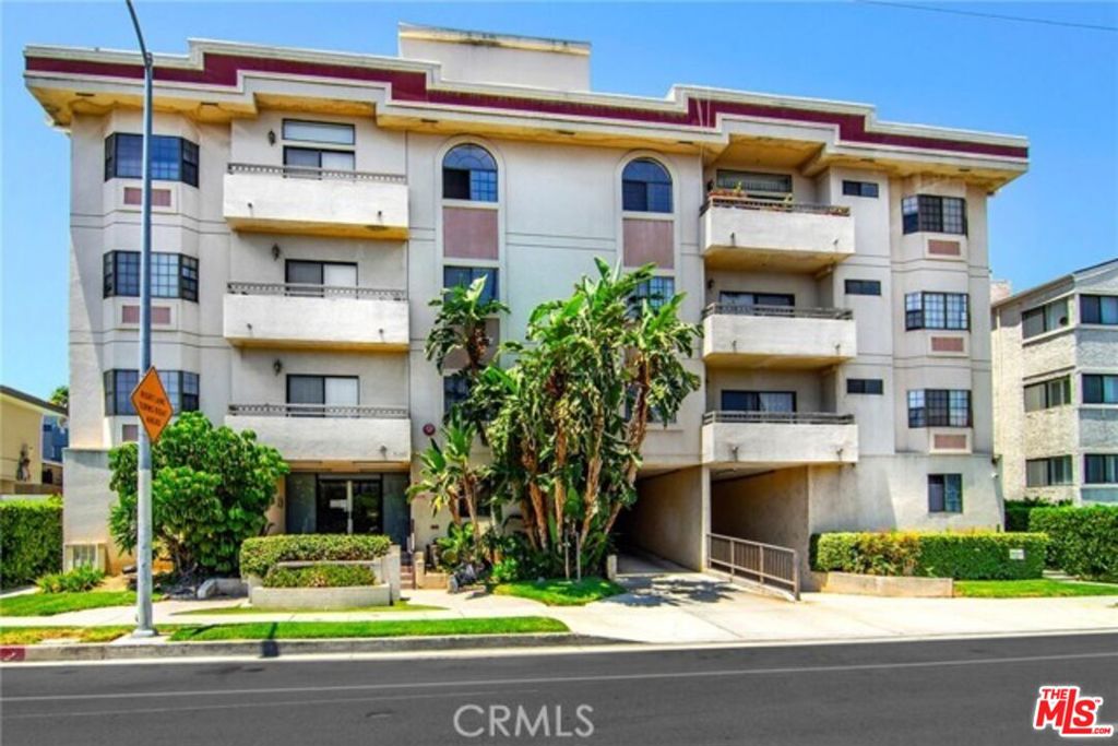 Welcome to this light-filled and spacious upper-level unit featuring 3 bedrooms and 3 full bathrooms in a well-maintained building. Bright spacious large living and dining area with high ceilings and direct access to a private balcony. The kitchen offers ample counter space and stainless steel appliances. The primary suite boasts its own private balcony, with fireplace a generous walk-in closet, and an oversized en-suite bathroom with dual vanities, a soaking tub, and separate shower. Central air conditioning, in-unit private laundry, and two assigned 2 parking spots. Located close to popular restaurants, shopping, this move-in ready has it all.
