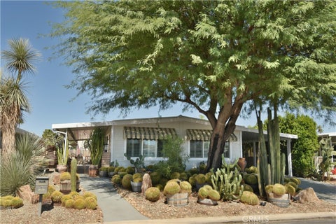 Photo of 73418 Palm Greens Pkwy Pkwy, Palm Desert, CA 92260 (MLS # PV26225426)