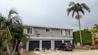 Two bedroom, one and half bath, two story townhome style end apartment with single car garage only 5 minute walk to Main Street, shopping, restaurants, and a ten minute walk to Huntington Beach Pier. Amenities include gas stove/oven, dishwasher, garbage disposal, refrigerator, and stackable washer/dryer unit. Upper level has two bedrooms with full bath. Unit all new Swiss coffee paint, new flooring downstairs and new carpet upstairs and on the stairs. New washer/dryer and refrigerator is being delivered on August 1, 2025. This unit will be ready for showings on Monday, August 4, 2025.