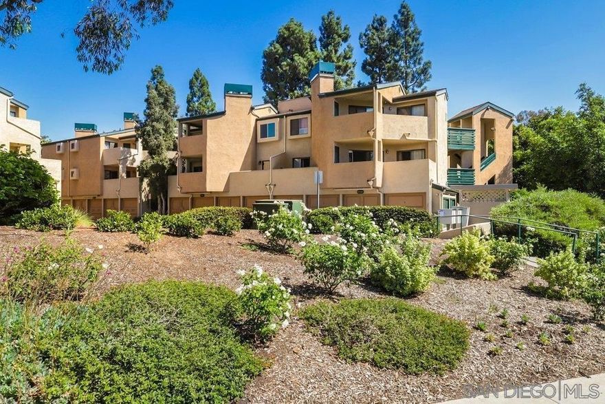 Welcome to Creekside living in Mira Mesa. This 1 bed, 1 bath condo offers granite counters, stainless appliances, and a gas fireplace. Enjoy your private balcony overlooking tranquil water features, plus in unit washer/dryer and a new central heat and A/C system installed in 2022. Ground level access with a 2 car tandem garage right across the hall from unit entrance. The complex features a pool, hot tub, and scenic grounds. Close to I-15, shopping, and dining. Perfect for easy San Diego living.  Additional features include luxury front load washer and dryer, built-in microwave, double-door refrigerator, dishwasher, and electric range. The new 18 SEER air conditioner installed in 2022 is still under warranty. Sliding doors from both the living room and bedroom open to an ample balcony with peaceful water feature views. The spacious bedroom offers generous closet space with mirrored doors. Parking includes a detached 2 car tandem garage conveniently located across the hall from the unit entrance, plus an additional unassigned parking space via permit. Water and trash included in HOA Fee. The Creekside community boasts resort style amenities including a swimming pool, hot tub, BBQ areas, and beautifully maintained grounds with waterfalls and koi ponds. Centrally located in Mira Mesa with quick access to Interstate 15, shopping centers, restaurants, and employment hubs. No stairs to unit entry.