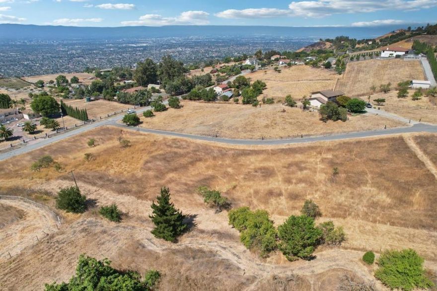 Rare Alum Rock Hills Lot  Luxury Home Plans + ADU Potential on 4.174 Acres Build your dream estate in the stunning Alum Rock Hills with breathtaking, unobstructed views stretching across San Jose. This remarkable property offers the perfect balance of privacy, natural beauty, and convenienceset on 4.174 acres of gently sloped land, just minutes from San Jose Country Club, Alum Rock Park, shopping, dining, and freeway access.  The property includes complete architectural plans for a 4,000+ sq. ft. luxury residence, along with updated septic, engineering, and civil reportsall of which can be provided in disclosures. Future potential is endless, as the land allows for up to two additional ADUs, creating opportunities for multi-generational living or income-producing units.  A shared water well with the neighboring property currently flows at 13 gallons per minute. Buyer will also benefit from a full suite of available reports, including Geologic, Civil, Septic, and Well.  This is a rare chance to create a custom hillside estate with modern plans already in motionall within minutes of the best that San Jose has to offer.