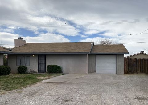 Photo of 21061 Nisqually, Apple Valley, CA 92308 (MLS # IV26063797)