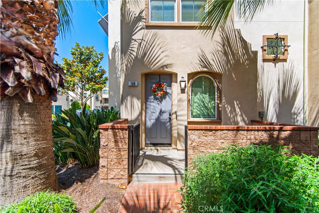 Fantastic End Unit Condo located within the Orchard Community built in 2017. This unit is 3 levels of stylish modern upgrades featuring an open floor plan. Features include water resistant engineered hardwood floors, kitchen with granite countertops and stainless-steel appliances it also adjoins the dining area and living room as well as sliding glass door which opens onto your private balcony additionally this level includes a cheerful powder room.
Down 1 level is the attached 2-car garage with indoor laundry area while to the front of the house is your gated private front porch leading to your entry way in the house. Upstairs on the 3rd level you will find 2 suites one of which has a large walk-in closet each suite has their own full bath.
The Community amenities include a pool and clubhouse. Transportation is a breeze with the close proximity of the Metro Station, freeway access to the 10, 60 and 210 corridors as well as Ontario International Airport. Close to Red Hill Country Club and Golf Course, Shopping, Entrainment and Dining at nearby Downtown Upland, Victoria Gardens and Ontario Mills.