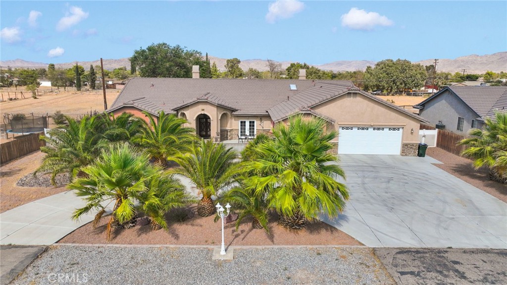 Welcome Home to this amazing 5 bedroom,3 bathroom home, Open Kitchen, living room, and dinning room, Split floor plan with additional bedroom and attached bathroom making this home have 2 Bedrooms with an Ensuite. Beautiful backyard with grass, covered patio, pool, what more could you ask for cross fenced!!! Electric gates for privacy all on almost 1 Acre...
COME check it out for yourself.
