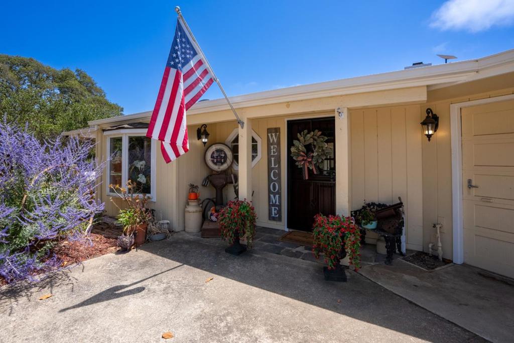 Property highlights include a 2-bedroom, 2-bathroom main house with a spacious living area, additional separate usable space with 2 rooms, greatly increasing the functionality of the home. Additional features include a pool house with a full bath and kitchen, a large shop/man cave, 12-foot covered RV parking, multiple outdoor patios, and an in-ground pool with a new automatic safety cover. Too many amenities to list, this property is truly one of a kind! Situated at the end of a quiet road within a well-established gated community, this 6.5-acre property offers the ideal setting for a private family compound. Conveniently located near Highways 1 and 101, it provides excellent commuter access. Grocery stores and restaurants are just a short drive away. The current owner also owns the adjacent undeveloped 5-acre lot, presenting a unique opportunity to bundle both properties for expansion or development.