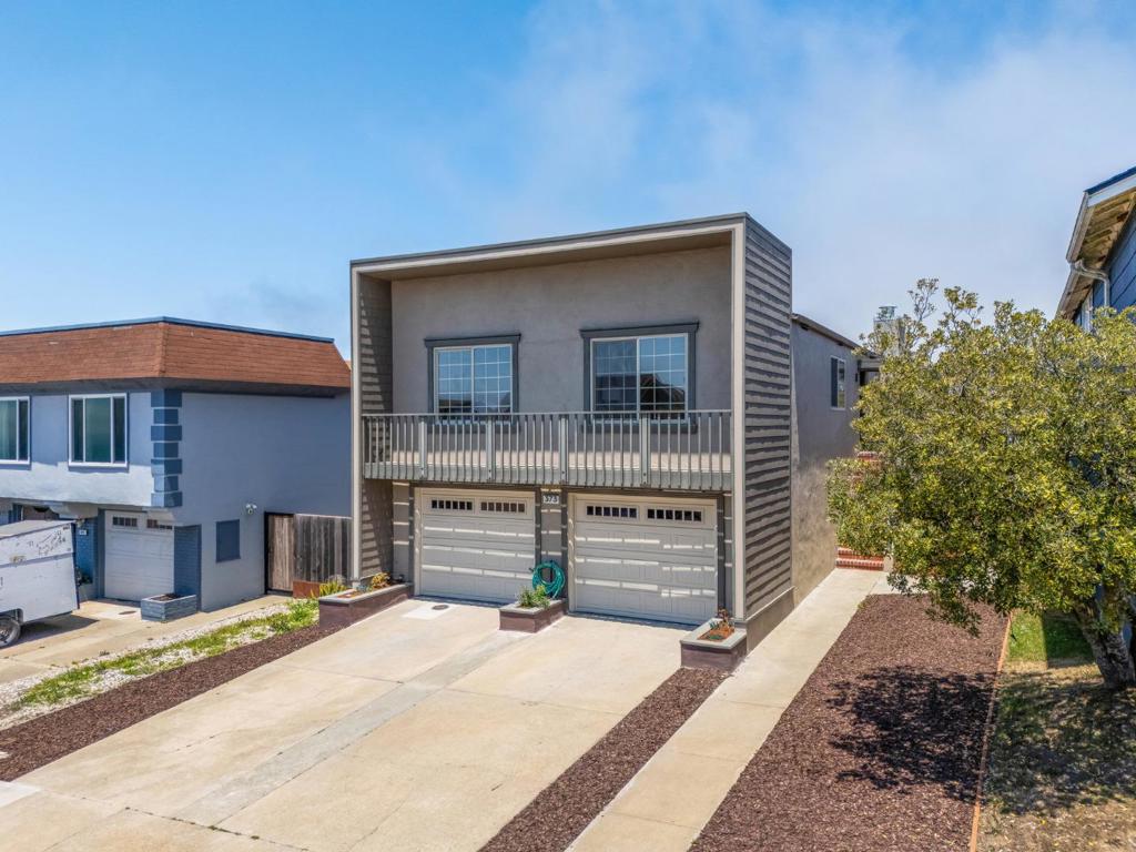 Enjoy sweeping ocean views in the coveted Fairmont Estates neighborhood of Pacifica. The exceptional floor plan offers 4 bedrooms, 3 full bathrooms, and a separate family room. The open concept kitchen, dining, and living room combo serves as the focal point of the home, showcasing views of the Pacific Ocean and surrounding hills. 3 bedrooms and 2 full bathrooms, including a primary suite, round off the main level. A well appointed family room and en suite 4th bedroom are located on the lower level. This area can function as in-law quarters or a great place for a home office. An oversized two car garage and separate laundry room complete the the 1st story of the home. The spacious rear yard further highlights gorgeous views of the ocean and rolling hills. 373 Coral Ridge Drive offers an Ideal commuter location with easy access to major highways, Bart, Caltrain and San Francisco International Airport. Pacifica's Northern Peninsula location is situated in one of the most robust job markets in the country. Many significant employers in the tech, bio-tech and financial sectors are in close proximity. Local amenities and recreation include, Fairmont Shopping Center, Serramonte Shopping center, beautiful beaches and Coastal trails.
