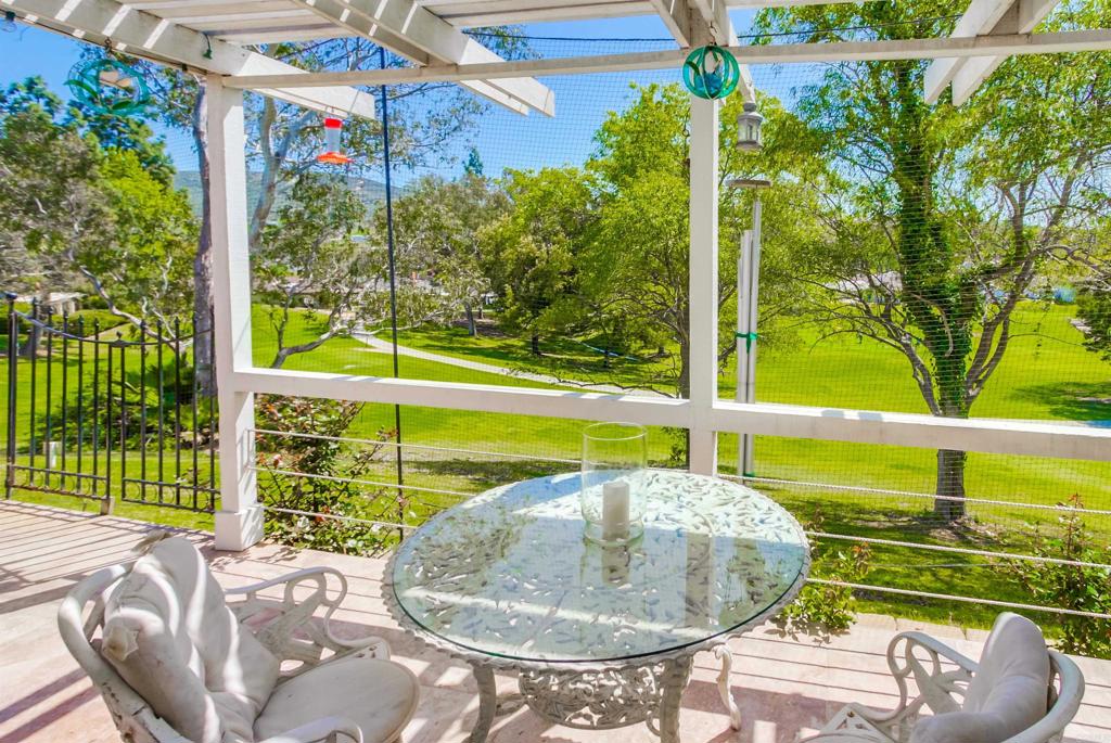 Nestled in the Country Greens at Lake San Marcos, this home provides tranquility as well as functionality. Appointed with soaring cathedral ceilings, warm inviting fireplace, sprawling golf course views, private patio, hardwood floors, granite counters, walking distance to all Lake San Marcos amenities.