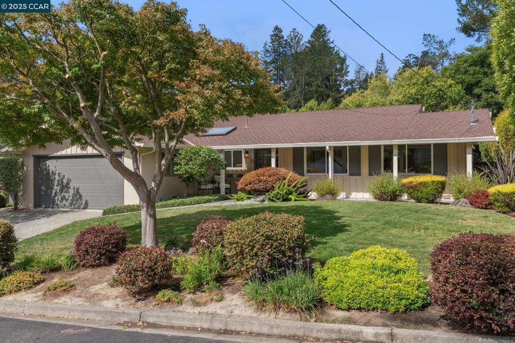 Here's your chance to own a classic Orinda ranch-style home near the desirable Ivy Drive neighborhood on a quaint cul-de-sac. A versatile floor plan for everyday living and effortless indoor/outdoor entertaining. The welcoming living room highlights hardwood floors and backyard views, while the galley kitchen showcases granite counters, custom cabinetry, and adjoins the dining area with cozy sitting space. Escape to the spacious primary suite with vaulted ceilings, skylight, and sitting area. Conveniently located close to top-rated K–12 Orinda schools, Moraga Valley Swim & Tennis Club, Moraga Country Club, scenic hiking trails, and the lively year-round farmer’s market. Come See! Open Sat & Sun 1-4