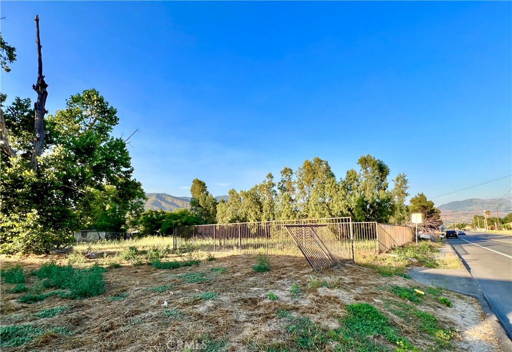 Located in North San Bernardino, this expansive 17,515 sq ft lot offers a prime opportunity for development. Near California State University, San Bernardino (CSUSB), the property is ideal for residential or multi-unit development. The lot is partially fenced, providing added privacy/security, equipped with curbs, sidewalks, and street lights, suitable for various building plans.With great development potential, this property allows for single-family residences, multi-generational set up/ multi-unit dwellings, ideal for investors/developers. Well located, with easy access to major freeways, schools, and amenities. Come visit.