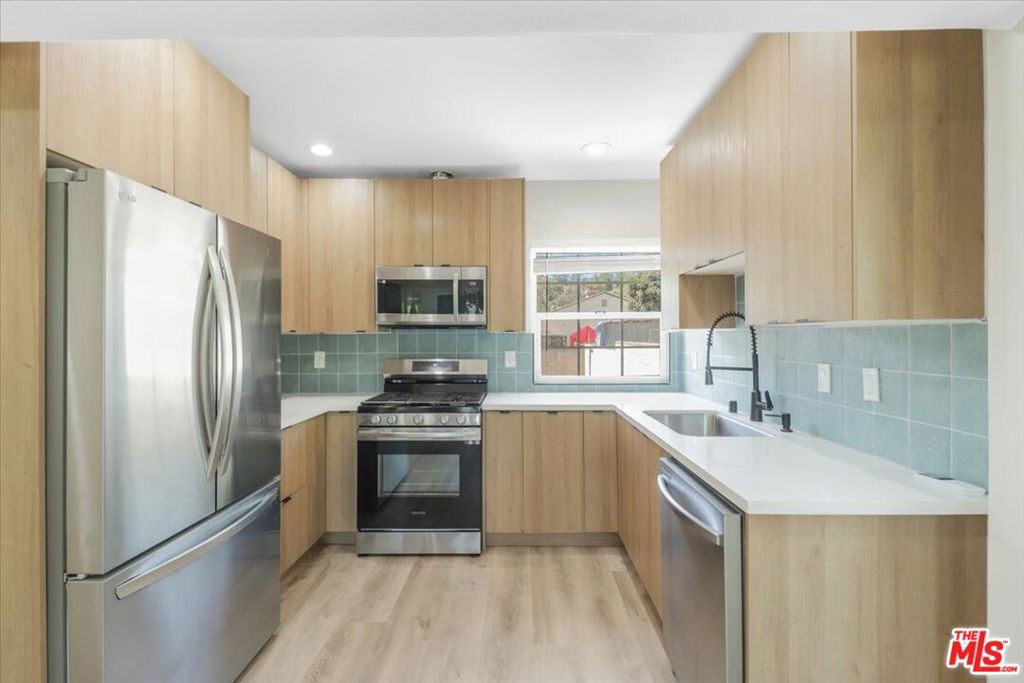 This is a remodeled duplex with excellent cash-flow potential! Both units feature 3 bedrooms & 2 bathrooms, and spacious private patios. Renovations include new HVAC, stainless appliances, windows, kitchen counters, doors, trim, flooring, and bathrooms, plus in-unit washer/dryers. The generous backyard offers potential to add an ADU for increased rental income. Prime location near Ascot Hills & Lincoln Park with panoramic DTLA views and just minutes to Cal State LA, Downtown, Elysian Park, Dodger Stadium, and major freeways. Live in one, rent the other, or lease both for strong returns! A turnkey investment with additional upside for value add in a central LA location.