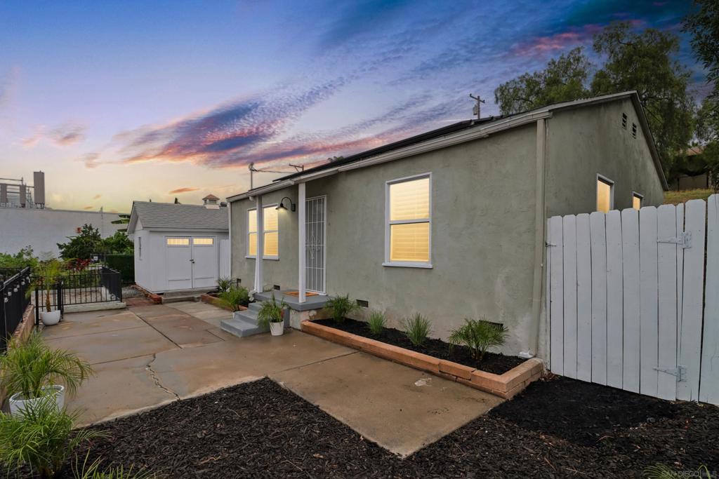 Dual-Zoned Opportunity! Residential & Commercial Zoning in Prime La Mesa Location! Welcome to 7282 University Ave, La Mesa—an elevated hilltop retreat offering incredible versatility in one of the area's most connected neighborhoods. This charming single-story home features residential and commercial zoning, making it ideal for homeowners, entrepreneurs, or savvy investors looking for a live/work opportunity. The light-filled interior includes dual-pane windows, recessed lighting, and central A/C and heating for year-round comfort. The updated kitchen boasts granite countertops, stainless steel appliances, and upgraded cabinetry, while the remodeled bathroom features a tiled shower, tile flooring, and modern finishes. An owned solar system adds long-term value and energy efficiency, and the detached 2-car garage offers additional functionality with convenient street access. One of the standout features is the bonus insulated structure—perfect as a home office, studio, gym, or creative space. The spacious yard is enhanced by mature fruit trees including two orange trees, one lemon tree, and one lime tree, offering the perfect backdrop for relaxing or gardening. Located within easy distance to top-rated Helix Charter High School and La Mesa Arts Academy, and just minutes to SDSU, Starbucks, shopping, dining, and major freeways, this home is ideally positioned for both convenience and lifestyle. VA and FHA financing are welcome, making this a rare opportunity to own a flexible-use property in the heart of La Mesa.