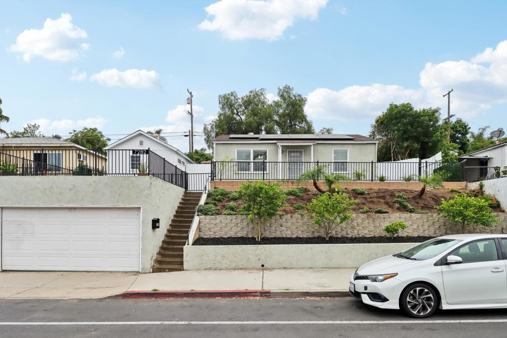 Stylish Hilltop Retreat Near SDSU! Discover this beautifully remodeled single-story detached home perched on a hill in a prime La Mesa location—just minutes from SDSU, shopping, dining, and major freeways. This charming residence blends comfort, convenience, and modern style with spacious living areas and thoughtful upgrades throughout. The light-filled interior features recessed lighting, dual pane windows, and sleek modern flooring. Embrace year-round comfort with central air conditioning and heating.The customized kitchen shines with stunning granite countertops, stainless steel appliances, and upgraded cabinetry—perfect for both everyday living and entertaining. The stylish bathroom includes tile flooring and a tiled shower with contemporary finishes. Enjoy a generous yard ideal for relaxing or creating your dream outdoor space. The detached two-car garage faces main street and a separate insulated storage unit can be converted into an office or any other flex use space offering added functionality and flexibility. The property is zoned residential/commercial. Ideally located next to Better Buzz Coffee, minutes from Helix Charter High School and the Joan Kroc Center. With its turnkey appeal and VA/FHA financing welcome, this home is ready for you to move in and enjoy all that vibrant La Mesa has to offer.