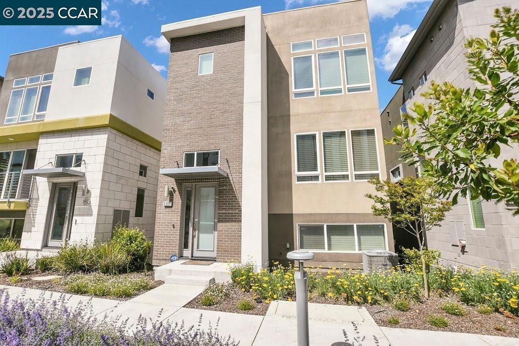 Step inside 2957 Valley of Hearts Delight Place—a beautifully upgraded tri-level home which was once the model home for the builder so this is a one of a kind - no other homes in the community will have these finishes and upgrades! Located in San Jose’s sought-after Communications Hill. This 4-bed, 3.5-bath residence blends modern design with a functional layout and thoughtful upgrades. The open-concept main level is filled with natural light and features soaring ceilings, spacious living and dining areas, and a chef’s kitchen with quartz countertops, stainless steel appliances, a farmhouse sink, and designer backsplash. Upstairs, the primary suite offers a walk-in closet and spa-style bath with dual vanities and a frameless glass shower. A ground-floor bedroom with full bath adds flexibility for guests, office, or multi-gen living. Enjoy premium touches like powered window shades, a water softener, custom garage cabinets, and epoxy-coated floors. HVAC is serviced twice a year, and pest control is on a quarterly plan—showcasing true pride of ownership. Relax on your private balcony or explore nearby trails. With easy access to downtown, major tech campuses, and commuter routes, this home offers style, comfort, and convenience. Welcome home!