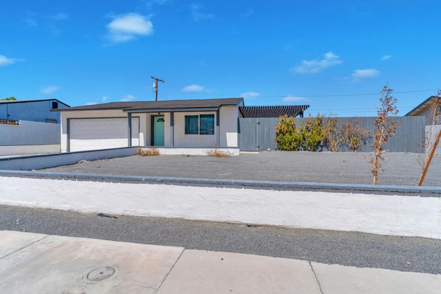 Step inside this beautifully remodeled 4-bedroom, 2-bathroom home and instantly feel the difference. Designed for modern, comfortable living, this residence has been meticulously updated from top to bottom. You'll enjoy an abundance of natural light shining through new dual-paned windows, which also ensure quiet and energy efficiency. The heart of the home--the kitchen and bathrooms--are fully updated, featuring elegant walk-in showers and new, easy-to-clean luxury vinyl plank (LVP) flooring that flows seamlessly throughout the entire house. Outside, you'll appreciate the spacious yet low-maintenance front and back yard, perfect for relaxing or entertaining without being a burden on your weekend. For your complete peace of mind, your rent includes a complete tech package: an active alarm system, video surveillance monitoring, and Wi-Fi are all set up and ready to go. The property is completed by an attached 2-car garage for secure parking and storage. This home is ready for a long-term tenant who is required to obtain renters insurance. If you're ready to secure this exceptional living space, please fill out an online rental application via RentSpree.