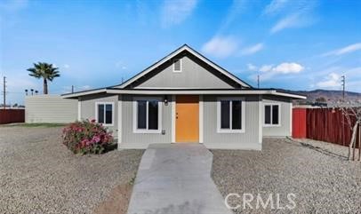 Welcome to this recently renovated home! Home features 2 spacious bedrooms and 1.5 newly remodeled modernized bathrooms. This inviting space offers a generous living area with new laminate vinyl flooring that flows into the newly renovated kitchen equipped with new cabinets, quartz countertops, a new stove, and microwave. Additional highlights include a separate dining area, new windows, a spacious backyard, a master bedroom with an en suite bathroom, a enclosed porch with laundry hookups, and ample front and back yard space.