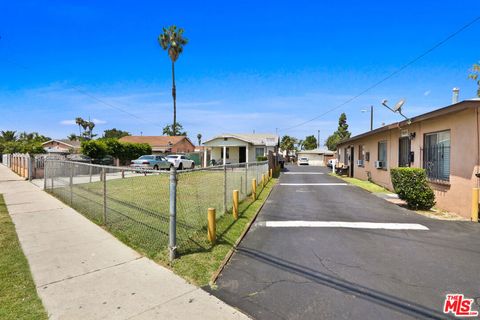 Photo of 7825 Jaboneria Road, Bell Gardens, CA 90201 (MLS # 26839859)