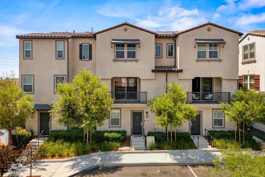 Welcome to 408 Carina Glen – where modern style, smart living, and unbeatable value come together! This stunning 2022-built home in the sought-after Eclipse community offers 4 bedrooms and 3.5 bathrooms, perfect for flexible living! It’s also the lowest-priced 4-bedroom home in the entire 92025 zip code– don’t miss this incredible opportunity! Step inside and fall in love with the beautiful neutral decor, fresh paint, and light wood-toned LVP floors. The functional tri-level layout offers a full bedroom and bathroom on the entry level – ideal for guests, multi-generational living, or a private home office. The heart of the home is the open-concept second floor – featuring a spacious living room, sparkling white kitchen with stainless steel appliances, white quartz countertops, and a huge island made for gathering and entertaining. Step out onto the large balcony and soak up that perfect SoCal weather! Upstairs, the luxurious primary suite features a spa-like bathroom and generous walk-in closet, while two additional spacious bedrooms and a full-size laundry area complete the top floor. Smart and energy-efficient features include paid solar, air conditioning, whole house fan, tankless water heater, and a large two-car garage. The low HOA includes resort-style amenities: sparkling pool, relaxing spa, outdoor living area with firepit, BBQ area, and a playground for the little ones. All this in a fantastic South Escondido location – close to freeways, top-rated schools, North County Fair Mall, San Diego Zoo Safari Park, restaurants, breweries, wineries, shopping, and just a quick drive to the beach! Modern living, incredible value, and an unbeatable location – 408 Carina Glen is the one you've been waiting for!
