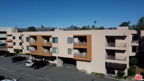 Photo of 6815 Remmet Avenue #215, Canoga Park, CA 91303 (MLS # 26666339)